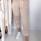 Tweedelige outfits voor dames: casual T-shirt en cropped joggingbroek