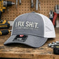 Truckerpet met mesh achterkant en “I Fix Shit“-borduurwerk