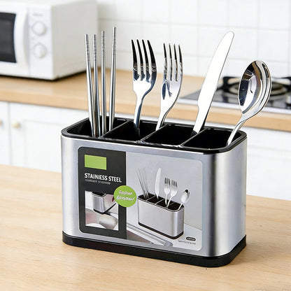 🎉 2026 Aanbieding — Meer dan 14.000 verkocht! 🍴✨ Nooit meer rommelig bestek — deze houder met 4 vakken houdt vorken, messen, lepels en eetstokjes netjes gescheiden. Afvoerbodem, compact formaat en stijlvolle RVS-look. 🏠